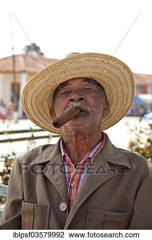 "Elderly man smoking a cigar, Vinales, Pinar del Rio Province, Cuba, North America" View Large Photo Image Stock Image - "Elderly man smoking a cigar, Vinales, Pinar del Rio Province, Cuba, North America". Fotosearch