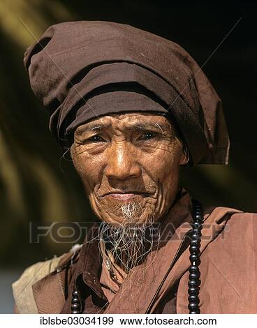 "Elderly pilgrim with a white beard wearing a linen robe, Mandalay, Mandalay Division, Myanmar, Burma, Asia" View Large Photo Image Stock Photo - "Elderly pilgrim with a white beard wearing a linen robe, Mandalay, Mandalay Division, Myanmar, Burma, Asia". Fotosearch