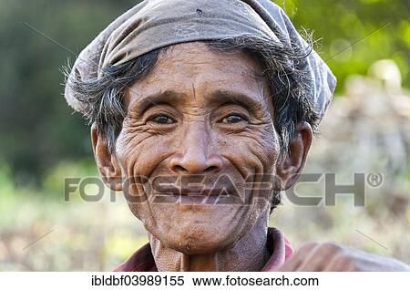 Stock Photography - "Elderly smiling man from the Lahu people, hill tribe, ethnic minority, portrait, Mae Hong Song Province, Northern Thailand, Thailand, Asia". Fotosearch