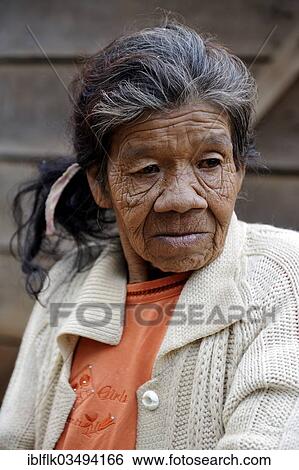Stock Photograph - "Elderly woman, 55, in a community of Guarani Indians, Jaguary, Caaguazu Department, Paraguay, South America". Fotosearch