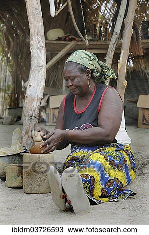 "Elderly woman making pottery in front of her stall, Rhumsiki, Far North, Cameroon, Africa" View Large Photo Image Stock Image - "Elderly woman making pottery in front of her stall, Rhumsiki, Far North, Cameroon, Africa". Fotosearch