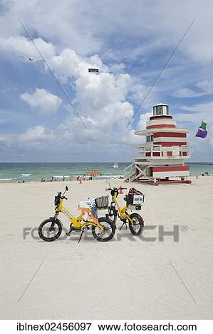 Stock Photo - "Electric bicycles, Watchtower, The Jetty, Miami Rescue Tower, South Beach, Miami, Florida, USA". Fotosearch
