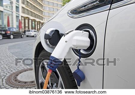 "Electric car, Opel Ampera, at a charging station, Berlin, Germany, Europe" View Large Photo Image Stock Photograph - "Electric car, Opel Ampera, at a charging station, Berlin, Germany, Europe". Fotosearch