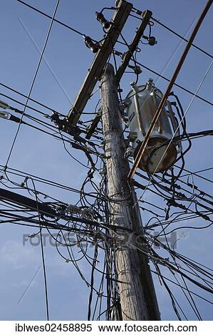 Stock Photography - "Electrical cables and telephone wires on a power pole, Staten Island, New York, United States, North America". Fotosearch