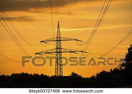 Stock Photo - "Electricity pylon at sunset, Stuttgart, Baden-Wurttemberg, Germany, Europe". Fotosearch
