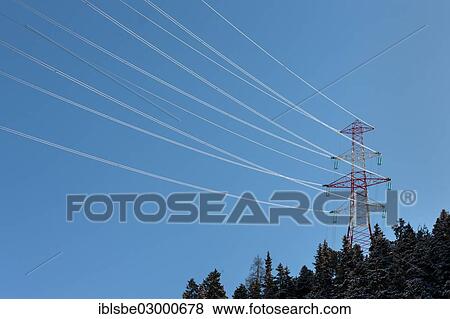 "Electricity pylon, high-voltage pylon, power pole, with a coniferous forest" View Large Photo Image Stock Photo - "Electricity pylon, high-voltage pylon, power pole, with a coniferous forest". Fotosearch