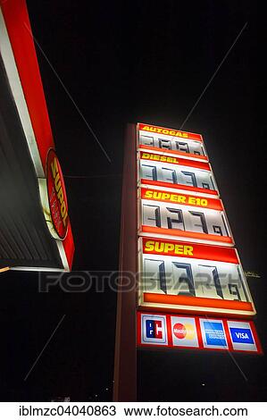"Electronic price list at a filling station against a black night sky, Nuremberg, Middle Franconia, Bavaria, Germany, Europe" View Large Photo Image Stock Image - "Electronic price list at a filling station against a black night sky, Nuremberg, Middle Franconia, Bavaria, Germany, Europe". Fotosearch