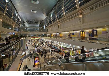 "Elevator and shops inside Dubai International Airport, Dubai, United Arab Emirates, Middle East, Asia" View Large Photo Image Stock Photograph - "Elevator and shops inside Dubai International Airport, Dubai, United Arab Emirates, Middle East, Asia". Fotosearch