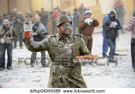 "Els Enfarinats flour fight, rebels, armed with flour, eggs and firecrackers, take over the regiment of the city for one day, Plaza de la Iglesia, Ibi, Province of Alicante, Costa Blanca, Spain, Europe" View Large Photo Image Stock Photo - "Els Enfarinats flour fight, rebels, armed with flour, eggs and firecrackers, take over the regiment of the city for one day, Plaza de la Iglesia, Ibi, Province of Alicante, Costa Blanca, Spain, Europe". Fotosearch