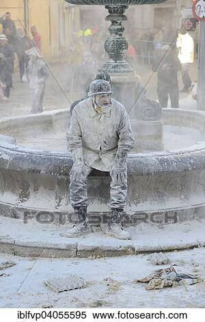 "Els Enfarinats flour fight, rebels, armed with flour, eggs and firecrackers, take over the regiment of the city for one day, Plaza de la Iglesia, Ibi, Province of Alicante, Costa Blanca, Spain, Europe" View Large Photo Image Stock Photography - "Els Enfarinats flour fight, rebels, armed with flour, eggs and firecrackers, take over the regiment of the city for one day, Plaza de la Iglesia, Ibi, Province of Alicante, Costa Blanca, Spain, Europe". Fotosearch