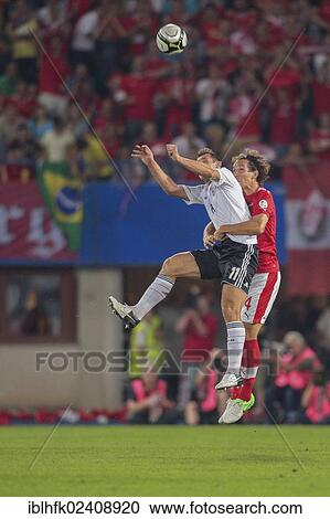 "Emanuel Pogatetz, #4 Austria, and Miroslav Klose, #11 Germany, fight for the ball during the WC qualifier soccer game on September 11, 2012 in Vienna, Austria, Europe" View Large Photo Image Stock Image - "Emanuel Pogatetz, #4 Austria, and Miroslav Klose, #11 Germany, fight for the ball during the WC qualifier soccer game on September 11, 2012 in Vienna, Austria, Europe". Fotosearch