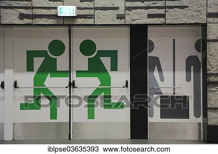 "Emergency exit and toilet pictograms on doors in the station at the airport, Brussels, Brussels Region, Belgium, Europe" View Large Photo Image Stock Image - "Emergency exit and toilet pictograms on doors in the station at the airport, Brussels, Brussels Region, Belgium, Europe". Fotosearch