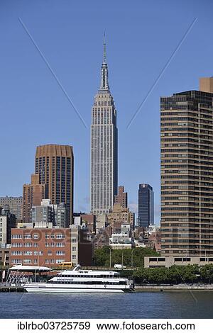 "Empire State Building seen from the East River, Manhattan, New York City, New York, United States, North America" View Large Photo Image Stock Photo - "Empire State Building seen from the East River, Manhattan, New York City, New York, United States, North America". Fotosearch