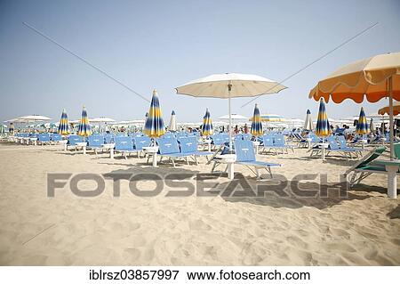 "Empty beach with parasols and sun beds, Rimini, Italy, Europe" View Large Photo Image Stock Photo - "Empty beach with parasols and sun beds, Rimini, Italy, Europe". Fotosearch