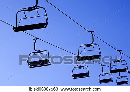 "Empty chairlift with backlighting, bei Bozen, South Tyrol province, Trentino-Alto Adige, Italy, Europe" View Large Photo Image Stock Image - "Empty chairlift with backlighting, bei Bozen, South Tyrol province, Trentino-Alto Adige, Italy, Europe". Fotosearch