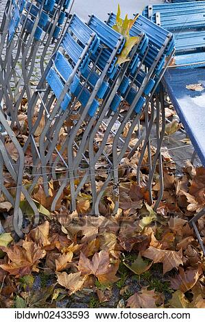"Empty tables and chairs of an outdoor restaurant in the rain with autumn leaves in the historic town centre of Cologne, Rhineland, North Rhine-Westphalia, Germany, Europe, PublicGround, Europe" View Large Photo Image Stock Image - "Empty tables and chairs of an outdoor restaurant in the rain with autumn leaves in the historic town centre of Cologne, Rhineland, North Rhine-Westphalia, Germany, Europe, PublicGround, Europe". Fotosearch