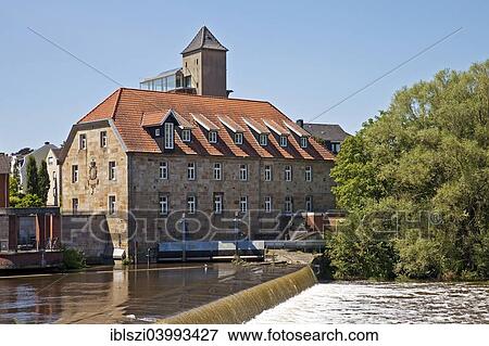 "Emswehr weir with the baroque mill, Rheine, Munsterland, North Rhine-Westphalia, Germany, Europe" View Large Photo Image Stock Photo - "Emswehr weir with the baroque mill, Rheine, Munsterland, North Rhine-Westphalia, Germany, Europe". Fotosearch