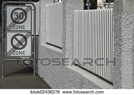Stock Photograph - "End of a 30km speed zone, traffic signs, Biberach, Upper Swabia, Baden-Wuerttemberg, Germany, Europe". Fotosearch