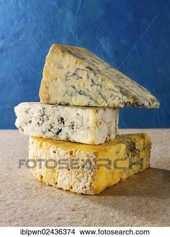 "English blue cheese, Stilton, White Stilton Cheese and Black Sticks" View Large Photo Image Picture - "English blue cheese, Stilton, White Stilton Cheese and Black Sticks". Fotosearch
