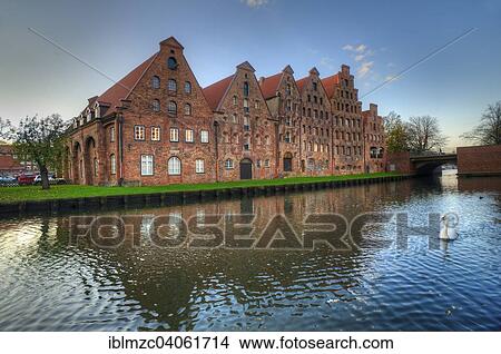 "Ensemble of brick gabled houses, former salt storage from 16th-18th century, Stadttrave canal at the front, Lubeck, Schleswig-Holstein, Germany, Europe" View Large Photo Image Picture - "Ensemble of brick gabled houses, former salt storage from 16th-18th century, Stadttrave canal at the front, Lubeck, Schleswig-Holstein, Germany, Europe". Fotosearch