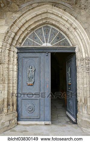 Stock Photo - "Entrance of Sainte Baudile Church, Noves, Bouches-du-Rhone, Provence-Alpes-Cote d'Azur, Southern France, France, Europe". Fotosearch