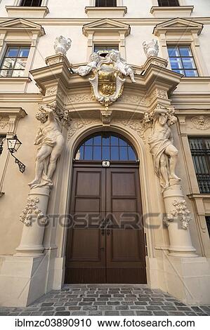 Stock Image - "Entrance porch with two Atlas figures from the Liechtenstein City Palace, built 1691-1705, Vienna, Vienna State, Austria, Europe". Fotosearch