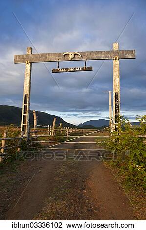 Stock Image - "Entrance to a cattle farm, Grande Terre, New Caledonia, France, Oceania". Fotosearch