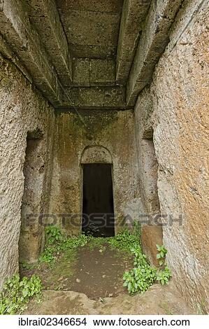 Picture - "Entrance to an ancient tumulus round grave, Tumulo del Colonnello, Etruscan Necropolis of La Banditaccia, Necropoli della Banditaccia, Cerveteri, province of Rome, Lazio region, Italy, Europe". Fotosearch
