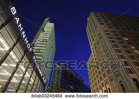 "Entrance to the railway station with Bahnturm tower, left, and Beisheim Center with the Ritz Carlton Hotel, right, on Potsdamer Platz square, in the evening, Mitte, Berlin, Berlin, Germany, Europe" View Large Photo Image Picture - "Entrance to the railway station with Bahnturm tower, left, and Beisheim Center with the Ritz Carlton Hotel, right, on Potsdamer Platz square, in the evening, Mitte, Berlin, Berlin, Germany, Europe". Fotosearch