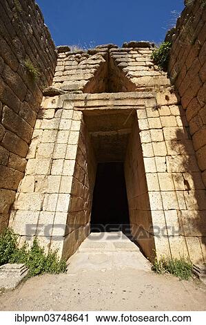 "Entrance to the Treasury of Atreus, an impressive """"tholos"""" beehive shaped tomb on the Panagitsa Hill, UNESCO World Heritage Site, Mycenae, Greece, Europe" View Large Photo Image Stock Image - "Entrance to the Treasury of Atreus, an impressive """"tholos"""" beehive shaped tomb on the Panagitsa Hill, UNESCO World Heritage Site, Mycenae, Greece, Europe". Fotosearch