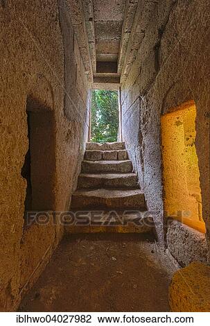 Stock Image - "Entrance tunnel to grave chamber, tomba, tumulus mound grave, Etruscan Necropolis, necropolis Banditaccia, UNESCO World Heritage Site, Cerveteri, Province of Rome, Lazio, Italy, Europe". Fotosearch