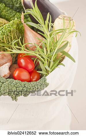 Environmentally friendly shopping bag filled with vegetables View Large Photo Image Stock Image - Environmentally friendly shopping bag filled with vegetables. Fotosearch