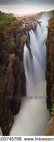 "Epupa Falls, Kunene river on the border between Namibia and Angola, Kunene Region, Namibia, Africa" View Large Photo Image Stock Photo - "Epupa Falls, Kunene river on the border between Namibia and Angola, Kunene Region, Namibia, Africa". Fotosearch