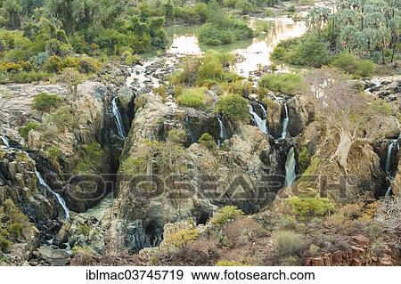 "Epupa Falls, Kunene river on the border between Namibia and Angola, Kunene Region, Namibia, Africa" View Large Photo Image Stock Photo - "Epupa Falls, Kunene river on the border between Namibia and Angola, Kunene Region, Namibia, Africa". Fotosearch