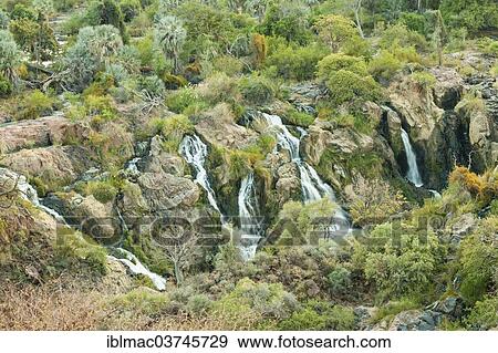 "Epupa Falls, Kunene river on the border between Namibia and Angola, Kunene Region, Namibia, Africa" View Large Photo Image Stock Photo - "Epupa Falls, Kunene river on the border between Namibia and Angola, Kunene Region, Namibia, Africa". Fotosearch