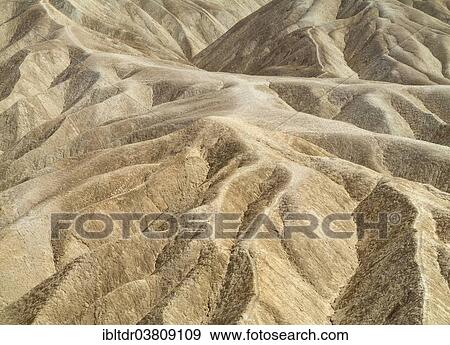 "Eroded badlands in the Gower Gulch seen from Zabriskie Point, Death Valley National Park, California, USA" View Large Photo Image Stock Photo - "Eroded badlands in the Gower Gulch seen from Zabriskie Point, Death Valley National Park, California, USA". Fotosearch