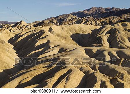 "Eroded badlands in the Gower Gulch seen from Zabriskie Point in the evening light, Death Valley National Park, California, USA" View Large Photo Image Stock Photo - "Eroded badlands in the Gower Gulch seen from Zabriskie Point in the evening light, Death Valley National Park, California, USA". Fotosearch