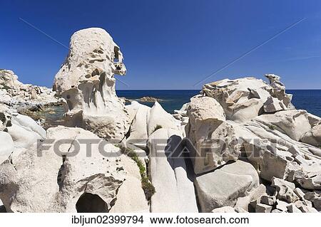 "Eroded granite rocks on the beach of Punta Molentis, Villasimius, Sarrabus, Cagliari province, Sardinia, Italy, Europe" View Large Photo Image Picture - "Eroded granite rocks on the beach of Punta Molentis, Villasimius, Sarrabus, Cagliari province, Sardinia, Italy, Europe". Fotosearch