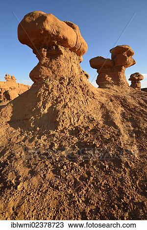 Stock Image - "Eroded hoodoos and Entrada Sandstone rock formations, Goblins, Goblin Valley State Park, San Rafael Reef Desert, Utah, Southwestern USA, USA". Fotosearch