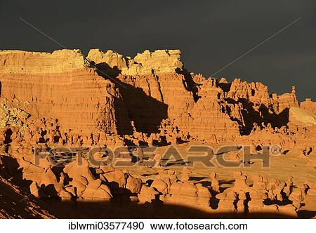 "Eroded hoodoos and rock formations of Entrada Sandstone in the morning light, dark clouds at back, Goblin Valley State Park, Utah, United States, North America" View Large Photo Image Stock Image - "Eroded hoodoos and rock formations of Entrada Sandstone in the morning light, dark clouds at back, Goblin Valley State Park, Utah, United States, North America". Fotosearch