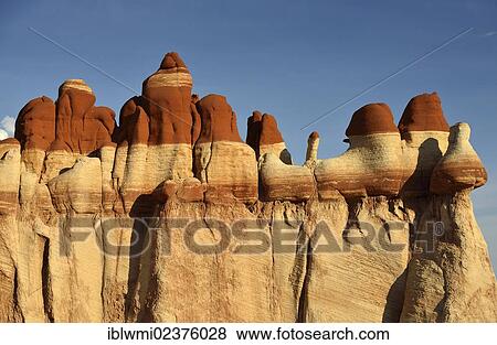"Eroded hoodoos and rock formations of the Blue Mosquito Canyon, discoloured by minerals, Coal Mine Mesa, Painted Desert, Hopi Reservation, Navajo Nation Reservation, Arizona, Southwestern USA, USA" View Large Photo Image Stock Photo - "Eroded hoodoos and rock formations of the Blue Mosquito Canyon, discoloured by minerals, Coal Mine Mesa, Painted Desert, Hopi Reservation, Navajo Nation Reservation, Arizona, Southwestern USA, USA". Fotosearch