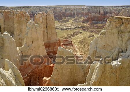 "Eroded hoodoos and rock formations discolored by minerals in Ha Ho No Geh Canyon, Moenkopi Wash, Coal Mine Mesa, Painted Desert, Hopi Reservation, Navajo Nation Reservation, Arizona, United States of America, USA" View Large Photo Image Stock Photography - "Eroded hoodoos and rock formations discolored by minerals in Ha Ho No Geh Canyon, Moenkopi Wash, Coal Mine Mesa, Painted Desert, Hopi Reservation, Navajo Nation Reservation, Arizona, United States of America, USA". Fotosearch