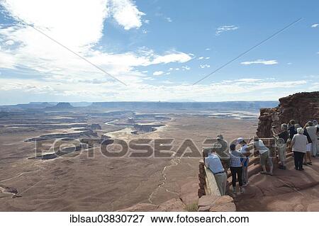 "Erosion landscape, canyons, tourists at the Green River Overlook, Canyonlands National Park, Utah, USA" View Large Photo Image Stock Photo - "Erosion landscape, canyons, tourists at the Green River Overlook, Canyonlands National Park, Utah, USA". Fotosearch