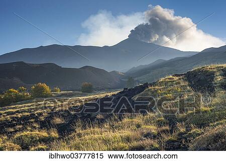 "Eruption column above the new northeast Crater, in front a lava field with vegetation, north side, Mount Etna, in Randazzo, Sicily, Italy, Europe" View Large Photo Image Stock Photography - "Eruption column above the new northeast Crater, in front a lava field with vegetation, north side, Mount Etna, in Randazzo, Sicily, Italy, Europe". Fotosearch