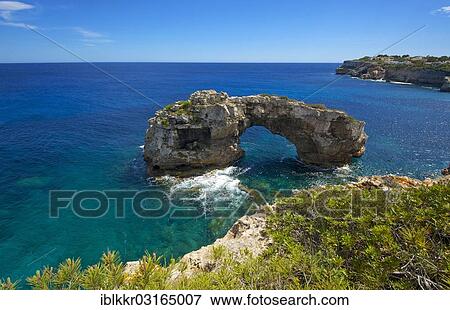 "Es Pontas natural arch, Cala Llombards, Santanyi, Majorca, Balearic Islands, Spain, Europe" View Large Photo Image Stock Photo - "Es Pontas natural arch, Cala Llombards, Santanyi, Majorca, Balearic Islands, Spain, Europe". Fotosearch