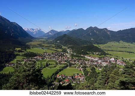 Stock Photo - "Eschenlohe, panoramic view from Heuberg Mountain, Wetterstein Range, Loisach, Loisachtal Valley, Werdenfels, Upper Bavaria, Bavaria, Germany, Europe". Fotosearch