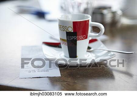 "Espresso cup with receipt, on a bistro table" View Large Photo Image Stock Photography - "Espresso cup with receipt, on a bistro table". Fotosearch