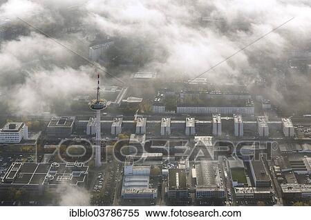 "ETEC, Essen Technology and Development Centre, and television tower through the clouds, aerial view, Essen, Ruhr area, North Rhine-Westphalia, Germany, Europe" View Large Photo Image Stock Photography - "ETEC, Essen Technology and Development Centre, and television tower through the clouds, aerial view, Essen, Ruhr area, North Rhine-Westphalia, Germany, Europe". Fotosearch