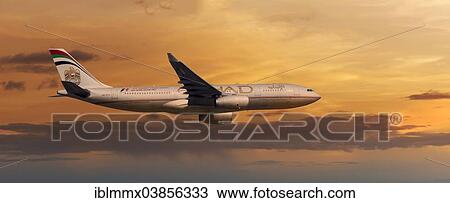 "Etihad Airways, Airbus A330-243, in flight, in the evening light" View Large Photo Image Stock Image - "Etihad Airways, Airbus A330-243, in flight, in the evening light". Fotosearch