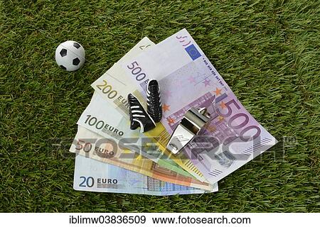 "Euro bills, football, soccer shoes, referee whistle" View Large Photo Image Stock Photo - "Euro bills, football, soccer shoes, referee whistle". Fotosearch